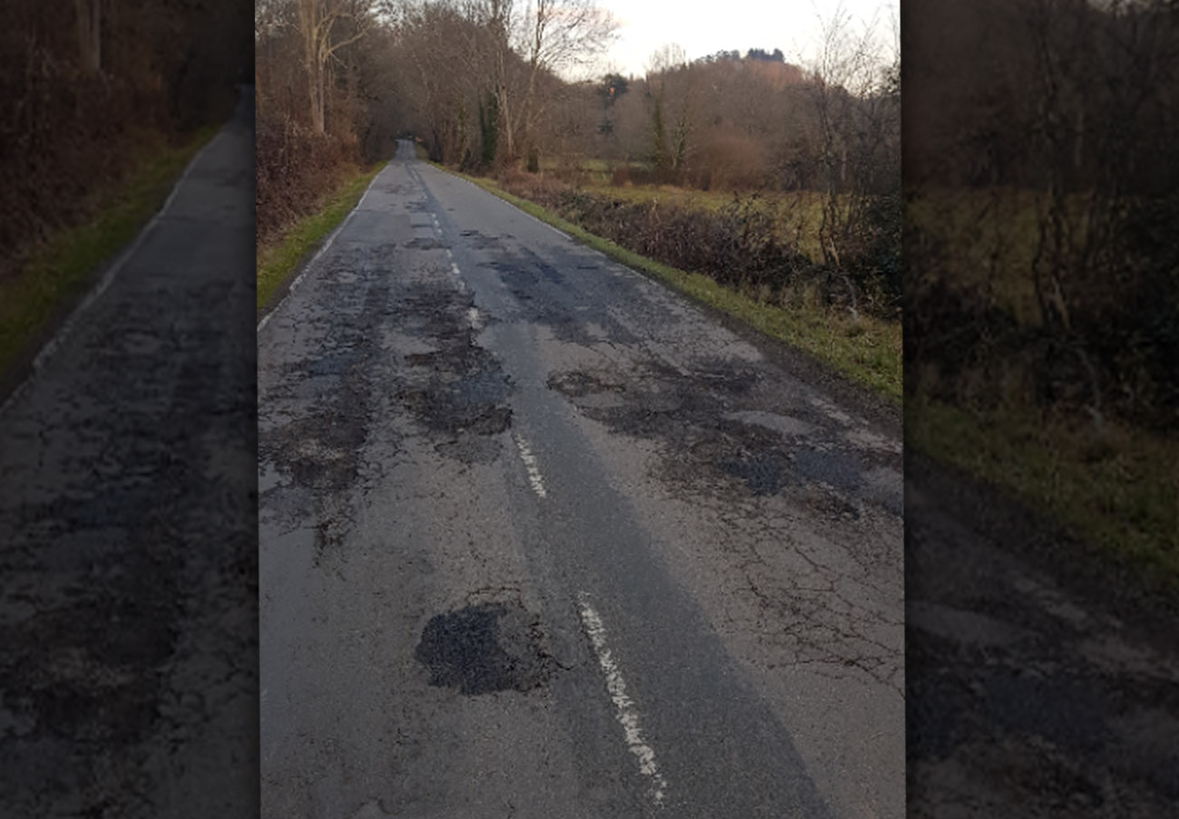 FACUA Asturias exige la inmediata reparación de la carretera de acceso a Pintueles
